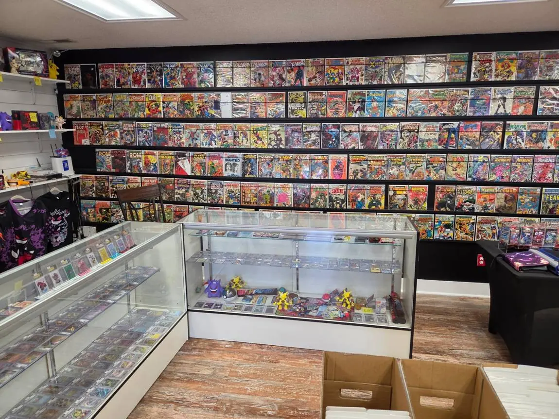 Pokémon shelf, graded card cases and the vintage comic wall