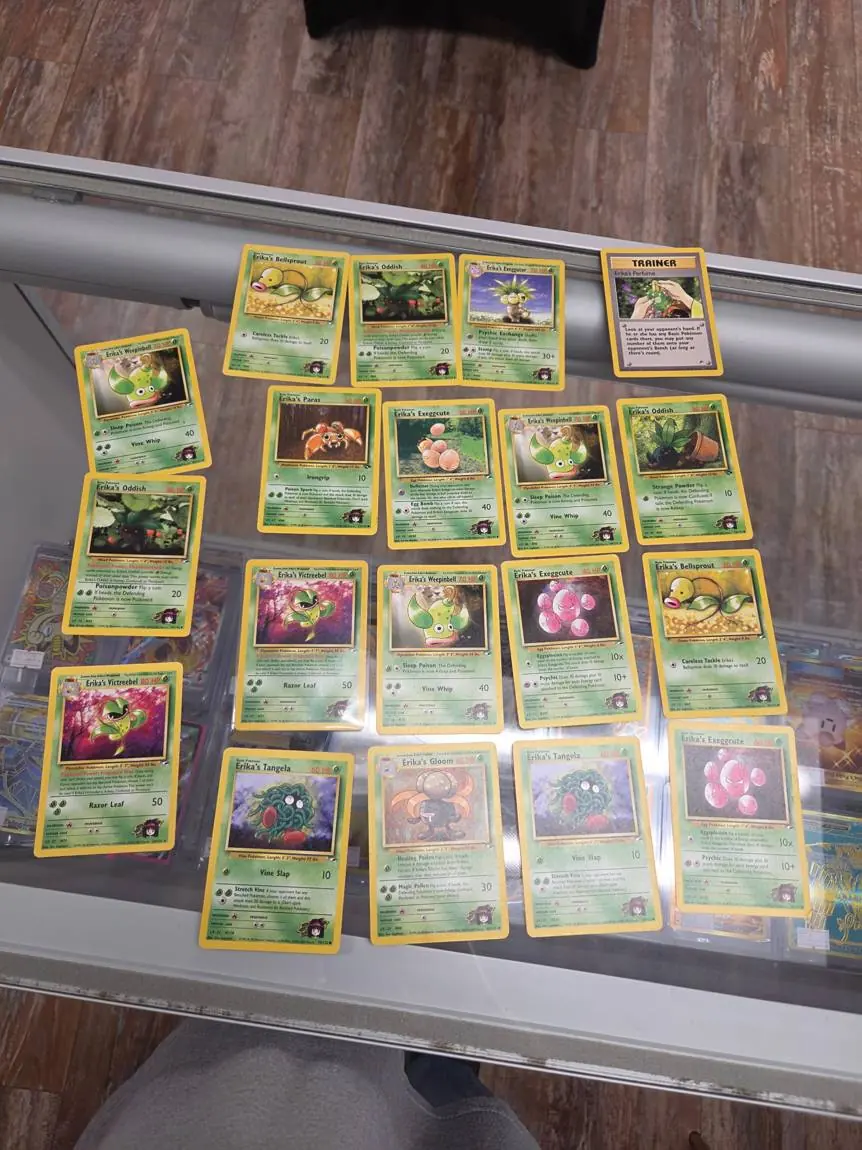 Vintage Gym Heroes Erika's Pokémon cards laid out on the case